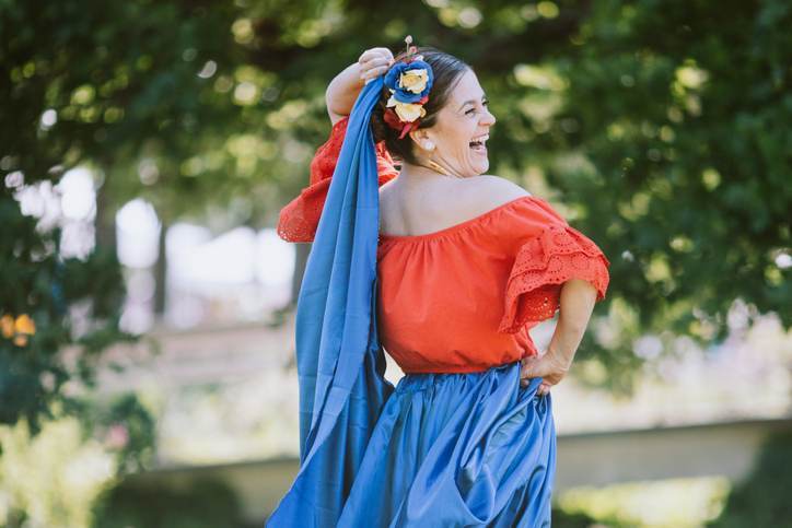 Mature Adult Woman Performing Colombian Traditional Dance